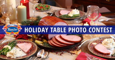Kunzler holiday table with photo contest banner