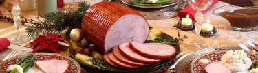 decorated holiday table with ham
