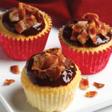 vanilla cupcakes with chocolate ganache and bacon crumbles